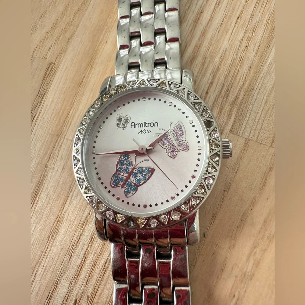 Armitron Now ladies butterfly silver tone watch NEW BATTERY